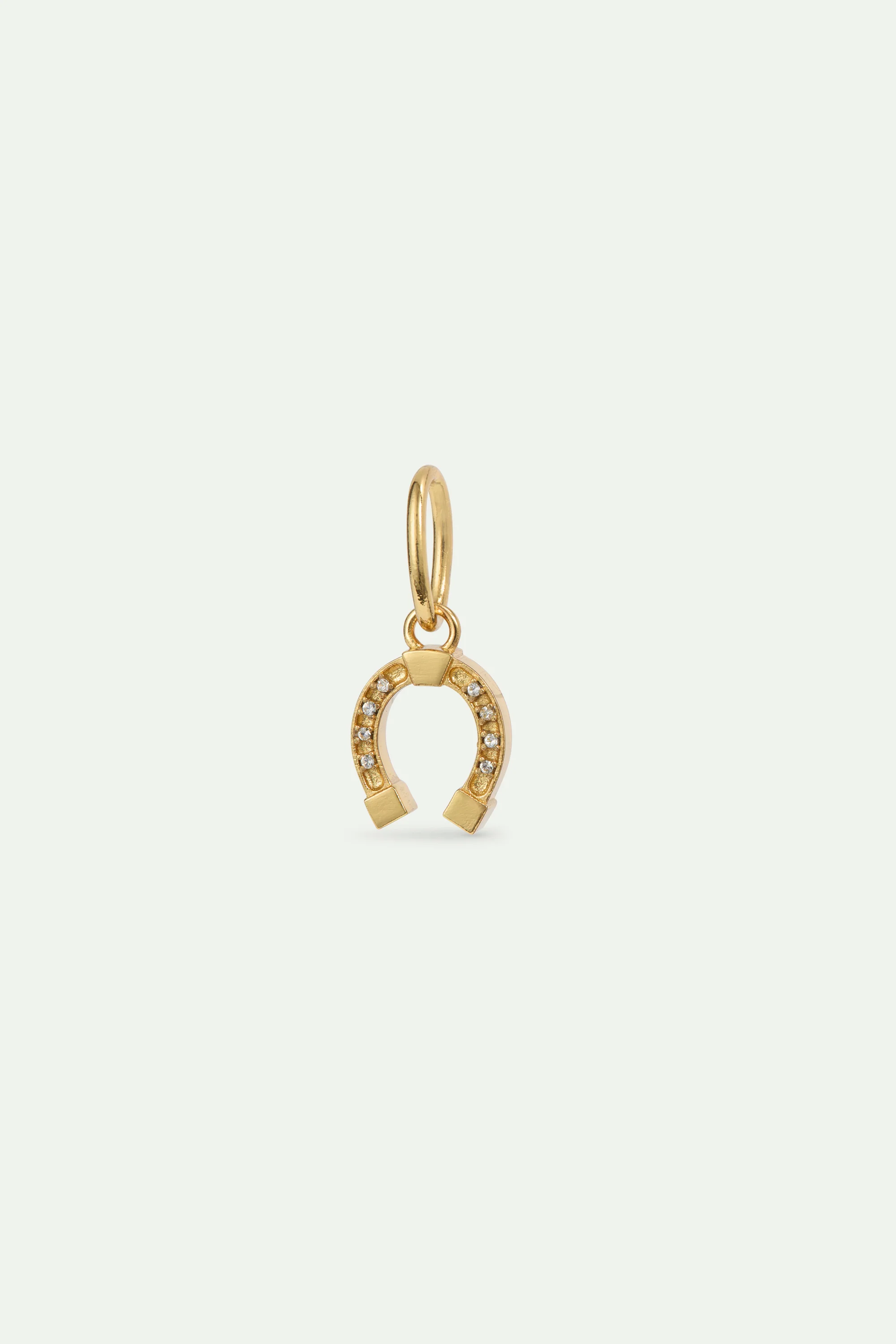 Pendentif Fer à cheval doré, Conjuration et Abnégation